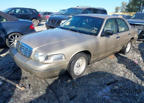 1999 Ford Crown Victoria Lx z USA, uszkodzony, nr VIN 2FAFP74W6XX228356